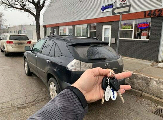 A person with car keys in hand.